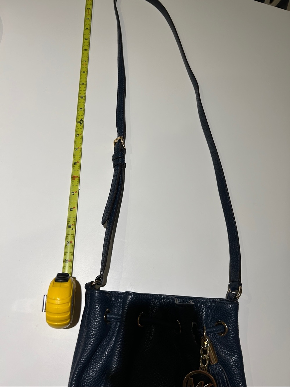 Michael Kors Navy Pebbled Leather Drawstring Crossbody with Gold MK Charm - Picture 11 of 11